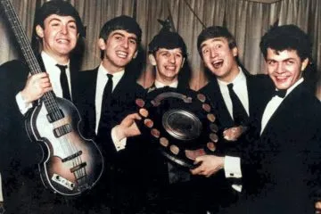 Bill Harry presenting the Beatles with their first ever award, the Mersey Beat Shield, 1963 © Bill Harry
