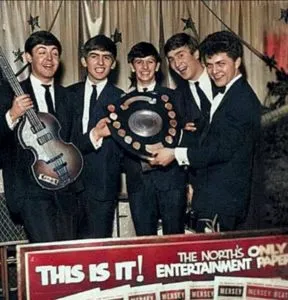 Bill Harry presenting the Beatles with their first ever award, the Mersey Beat Shield, 1962 © to the owners